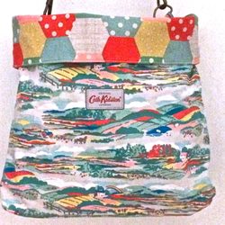 Cath Kidston - I love the material and reversible versatility. 08/02/25