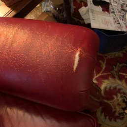 Torn leather on arm and degrading flaking arm leather. Torn leather on arm and degrading flaking arm leather.
