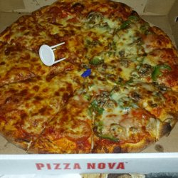 Pizza Nova - The purple thing in the middle is the piece of glove.