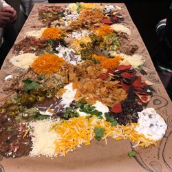 Uptown Sports Bar & Grill - this is the slop nachos served table side