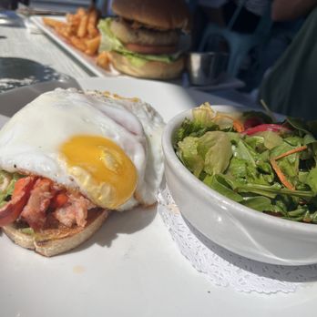Whalers - Lobster avocado toast, Crab Cake Sandwich in the background - Bars Near Me - Bay Shore, New York Whalers - Lobster avocado toast, Crab Cake Sandwich in the background - Bars Near Me - Bay Shore, New York