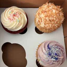 Red velvet, vanilla cupcake, with vanilla cream cheese frosting and sprinkles, coconut, toffee, Toasted Coconut Cream Cupcake Red velvet, vanilla cupcake, with vanilla cream cheese frosting and sprinkles, coconut, toffee, Toasted Coconut Cream Cupcake