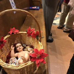 Saint Anthony Catholic Church - Families bring their crèche babes to be blessed.