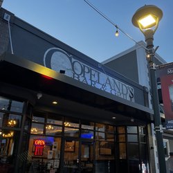 Copeland’s Bar & Grill - Outside at nighttime.