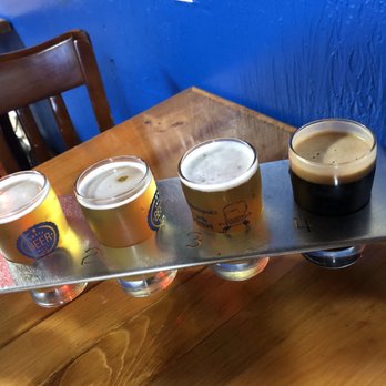 Crescent Moon Ale House - Beer Flight: CS Mango, Delirium Tremens, Infusion Vanilla, Avery Maple (Left to right) - Best place to taste beer. Loved it! - Pubs Near Me - Omaha, Nebraska