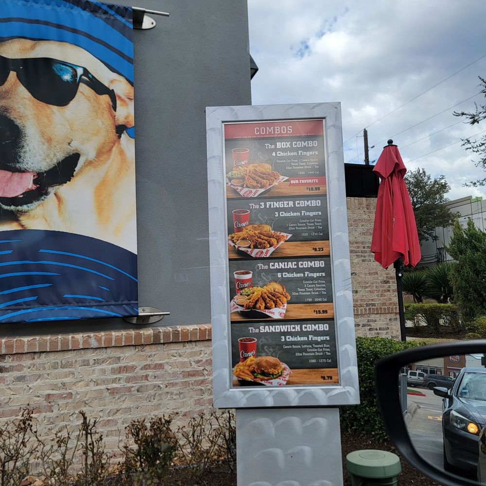 Raising Cane's Chicken Fingers - a dog wearing a bandana and sunglasses - Fast Food Near Me - Houston, Texas Raising Cane's Chicken Fingers - a dog wearing a bandana and sunglasses - Fast Food Near Me - Houston, Texas