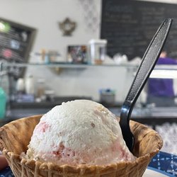 Mad Hatters Ice Cream Shop - Raspberry cheesecake ice cream in a cone cup
