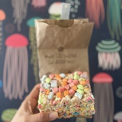 Flour Bakery + Café - How to celebrate St. Paddy's Day in your 40s. Get a rainbow lucky charm rice krispies treat from your ESB (emotional support bakery).