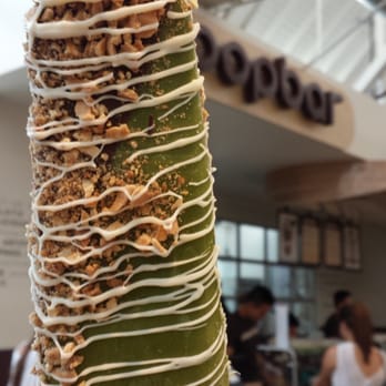 Popbar - Green tea popbar dipped in dark chocolate and waffle cones with a white chocolate drizzle. Noms. - Desserts Near Me - Anaheim, California