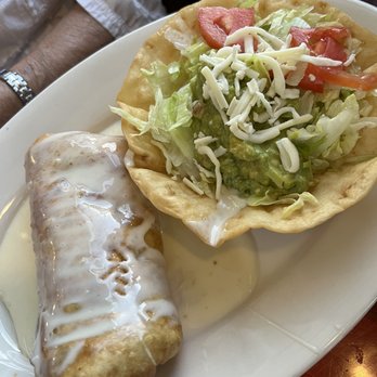 Vallarta's Mexican Restaurant - Beef Chimichanga which include an avocado salad - Mexican Near Me - Odessa, Florida Vallarta's Mexican Restaurant - Beef Chimichanga which include an avocado salad - Mexican Near Me - Odessa, Florida
