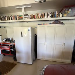 Overhead shelf storage - 18" deep, 2 shelves 8' wide.