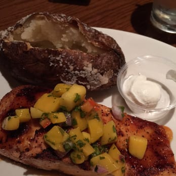 Outback Steakhouse - Firecracker Salmon and a dry baked potato - Steakhouses Near Me - Corpus Christi, Texas