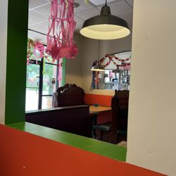 Chapultepec Mexican Restaurant - Peek through window to another dining area.