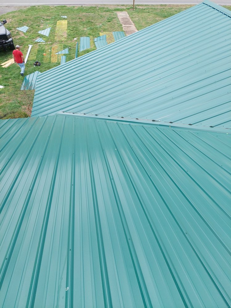 Slide of TMT Roofing