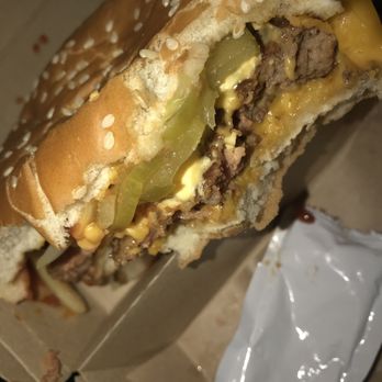 McDonald's - a cheeseburger with a bite taken out of it - Fast Food Near Me - Savannah, Georgia McDonald's - a cheeseburger with a bite taken out of it - Fast Food Near Me - Savannah, Georgia