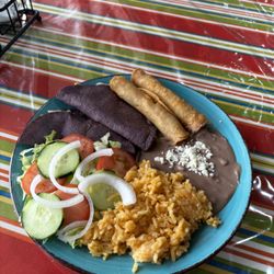 Tacos Jimenez - "Quesadilla & Flauta special" our Lunch special with 2 quesadillas made out of blue maíz and 2 chicken flautas