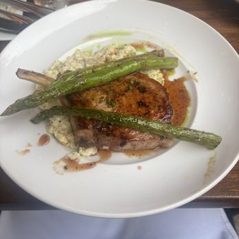 The Mill Kitchen and Bar - The pork chop with potato salad and asparagus was chef's kiss - New American Near Me - Roswell, Georgia The Mill Kitchen and Bar - The pork chop with potato salad and asparagus was chef's kiss - New American Near Me - Roswell, Georgia