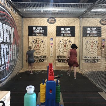 Bury The Hatchet - Paramus - A combo game of throwing and connect 4! - Axe Throwing Near Me - Paramus, New Jersey Bury The Hatchet - Paramus - A combo game of throwing and connect 4! - Axe Throwing Near Me - Paramus, New Jersey