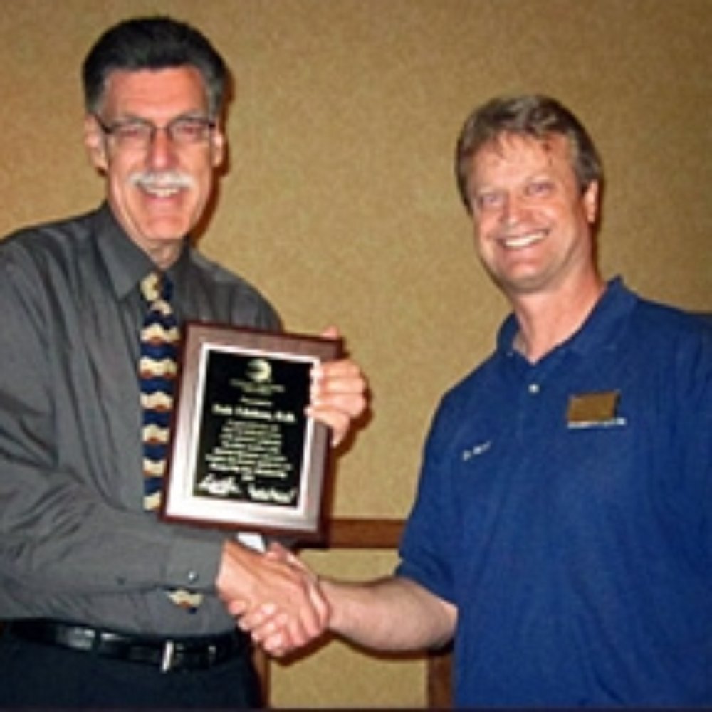Dr. Edelson accepting an award for excellence Dr. Edelson accepting an award for excellence