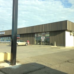 A & B Pizza - North Bismarck - Very nondescript store-front.