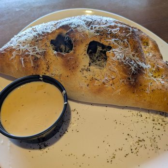 Sauce on the Side - The fold with queso - Italian Near Me - Creve Coeur, Missouri