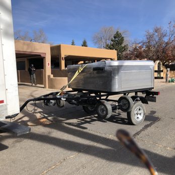 Advance Relocation - Trailer with the hot tub - Movers Near Me - Santa Fe, New Mexico