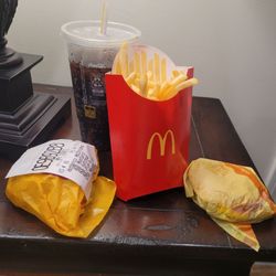 McDonald's - Two cheese burgers with a hot and spicy mcchicken and a flat dr pepper