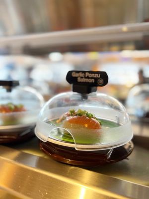 Kura Revolving Sushi Bar by null