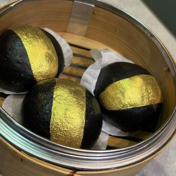 Supreme Dumplings - Charcoal Gold Lava Custard Bun W/ Gold Flakes - Shanghainese Near Me - Bellevue, Washington