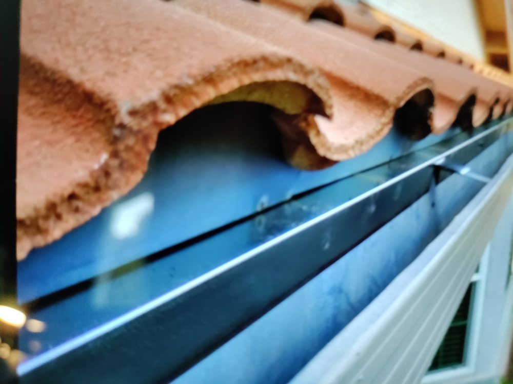 Slide of Quinn Bro's Roofing