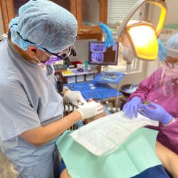 Dr. Rush Sunar performing an implant procedure