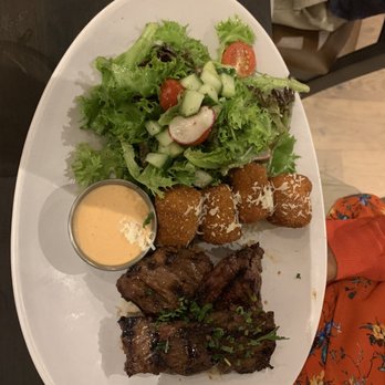Cheever Tavern - Steak tips, loaded Tater tots, salad - New American Near Me - Norwell, Massachusetts