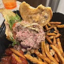 The Burger Den - If you you want cold, soggy, RAW burger... Look no further. Doordash waited for 30 minutes for this beauty! Bon Appétit