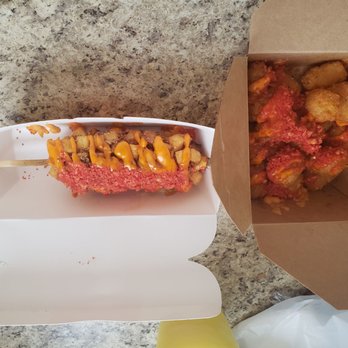 Two Hands Corn Dogs - Potatoe dog on the left. Dirty fries on the right. - Korean Near Me - Tucson, Arizona