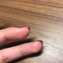 Quality Nail Spa - Glue and other nail product the nail technician failed to remove from my skin even after I request her to move it.