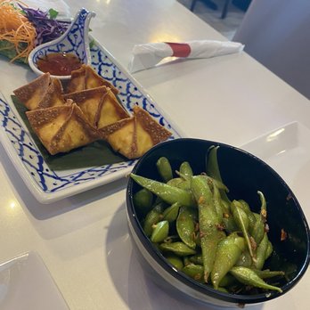 Charm Thai Bistro - Cream cheese wontons and spicy garlic edamame - Thai Near Me - Spring, Texas Charm Thai Bistro - Cream cheese wontons and spicy garlic edamame - Thai Near Me - Spring, Texas