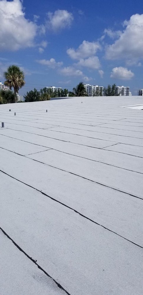 Slide of Dan Tennis Roofing