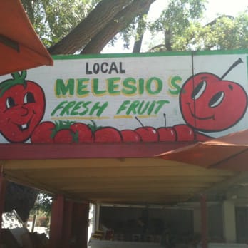 Melesio S. Fresh Fruit - a sign for melesio's fresh fruit - Farmers Market Near Me - Gilroy, California