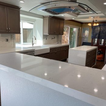Seaside Construction Solutions - a kitchen with white countertops - General Contractors Near Me Seaside Construction Solutions - a kitchen with white countertops - General Contractors Near Me
