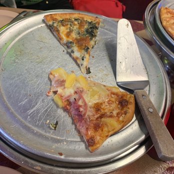 Manny's Pizza House VI - What was left of a half spinach and half Hawaiian pizza lol - Pizza Near Me - Port Orange, Florida