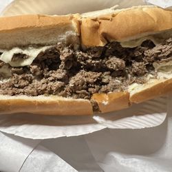 Junior Pizza - Look how dry this steak and cheese.