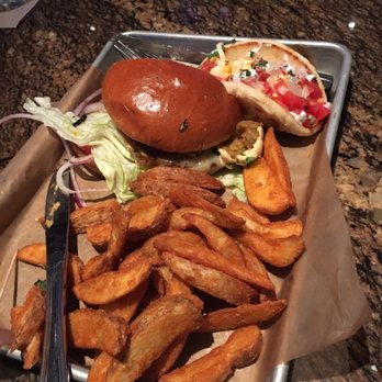 BJ's Restaurant & Brewhouse - Crispy jalapeño burger and a cauliflower pita taco, we were sharing - New American Near Me - Katy, Texas BJ's Restaurant & Brewhouse - Crispy jalapeño burger and a cauliflower pita taco, we were sharing - New American Near Me - Katy, Texas