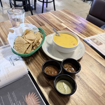 Jalisco Y Tequila Bar And Grill - 3 different salsas, queso and fresh chips. - Bars Near Me - Manor, Texas Jalisco Y Tequila Bar And Grill - 3 different salsas, queso and fresh chips. - Bars Near Me - Manor, Texas