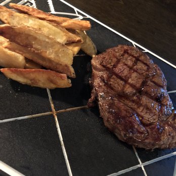 Garage 75 - Ribeye with potato wedges $2 to substitute fries for wedges - Bars Near Me - Charleston, South Carolina Garage 75 - Ribeye with potato wedges $2 to substitute fries for wedges - Bars Near Me - Charleston, South Carolina