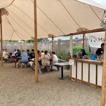 Mad Minnow Bar & Kitchen - Outside dining area - Cocktail Bars Near Me - Harwich Port, Massachusetts Mad Minnow Bar & Kitchen - Outside dining area - Cocktail Bars Near Me - Harwich Port, Massachusetts