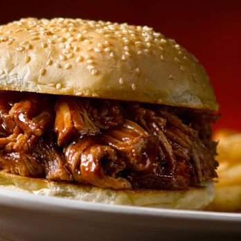 Fired Up Grill - a pulled pork sandwich and french fries - Food Trucks Near Me Fired Up Grill - a pulled pork sandwich and french fries - Food Trucks Near Me