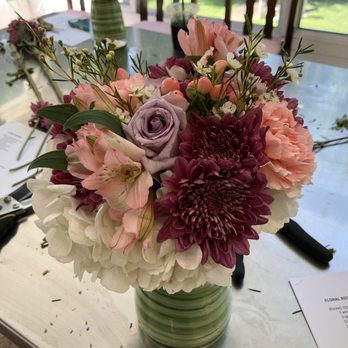 Peekaboo Blooms - Short centerpiece arrangement - Florists Near Me