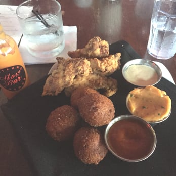 Slow Bar - The "Southern Fry" - fried chicken, hushpuppies, dijon sauce, honey jalapeño butter, BBQ sauce. Excellent! - Lounges Near Me - Portland, Oregon Slow Bar - The "Southern Fry" - fried chicken, hushpuppies, dijon sauce, honey jalapeño butter, BBQ sauce. Excellent! - Lounges Near Me - Portland, Oregon