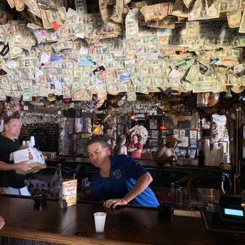 Captain Tony's Saloon - Dollar bills and bras adorn every flat feature - Dive Bars Near Me - Key West, Florida