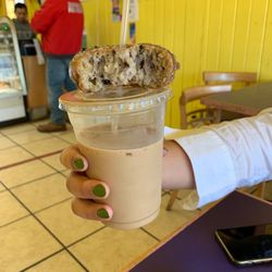 Hometown Donuts - Blueberry cake donut and latte with hazelnut